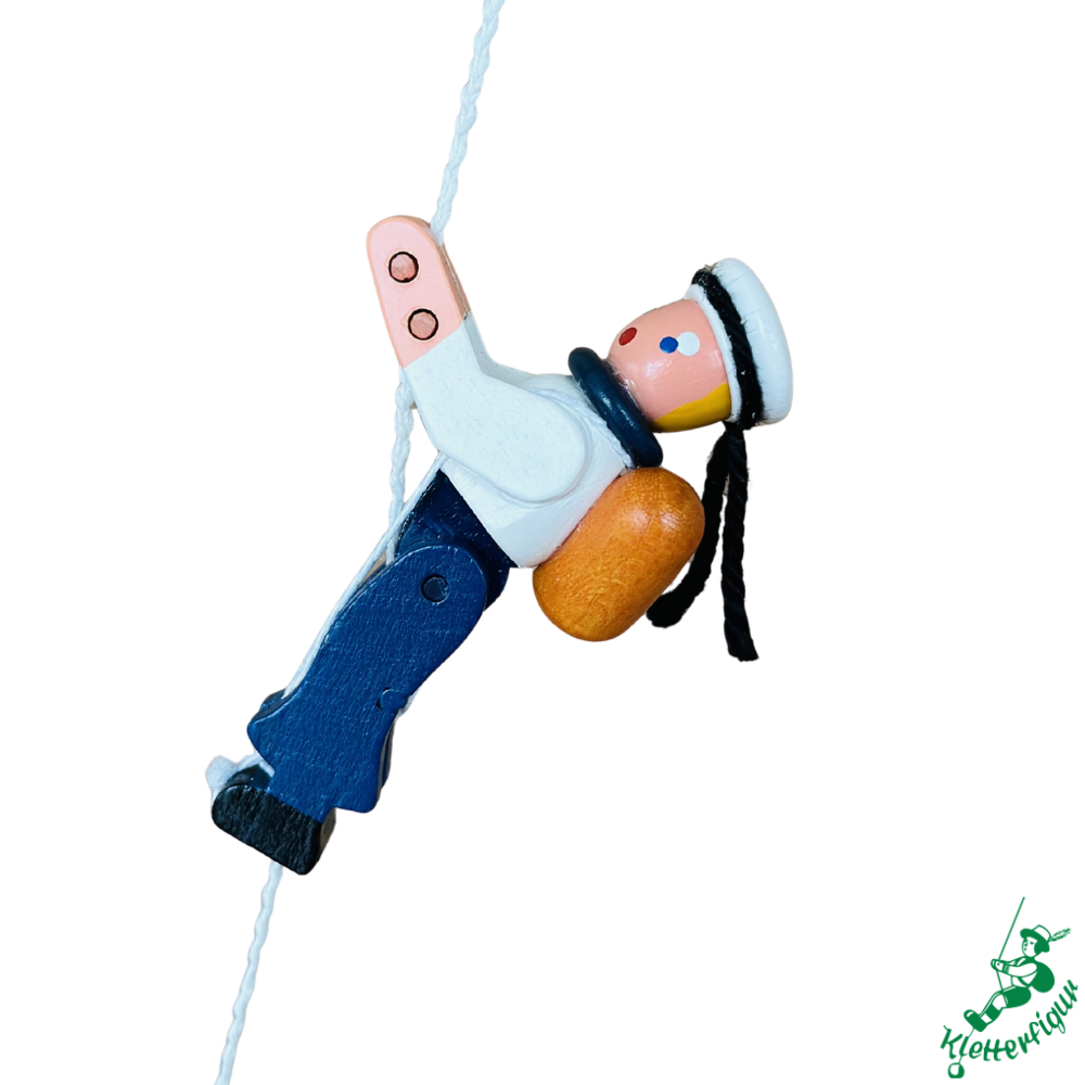 Climbing Sailor Figurine with Duffle Bag