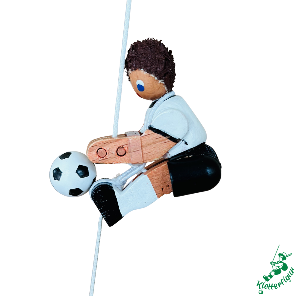 Climbing figurine football player