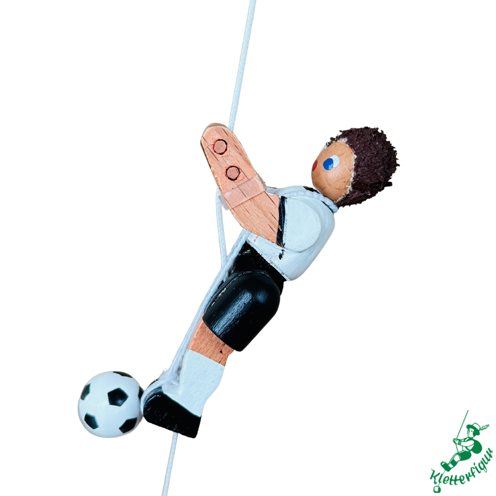Climbing figurine football player