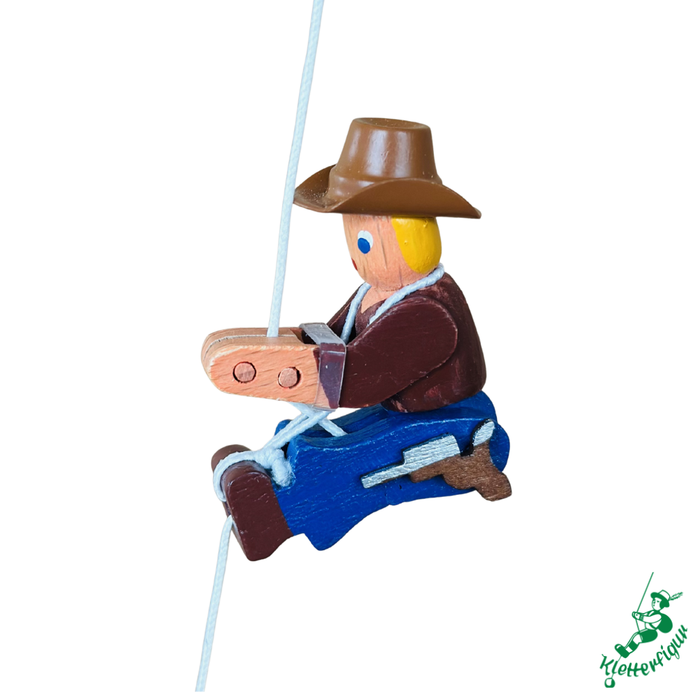 Climbing figure cowboy