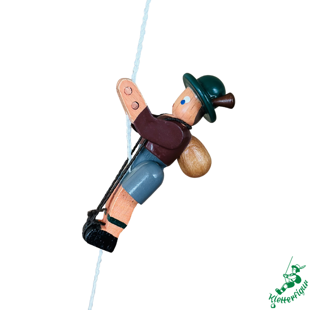 Climbing figure mountaineer with brown jacket