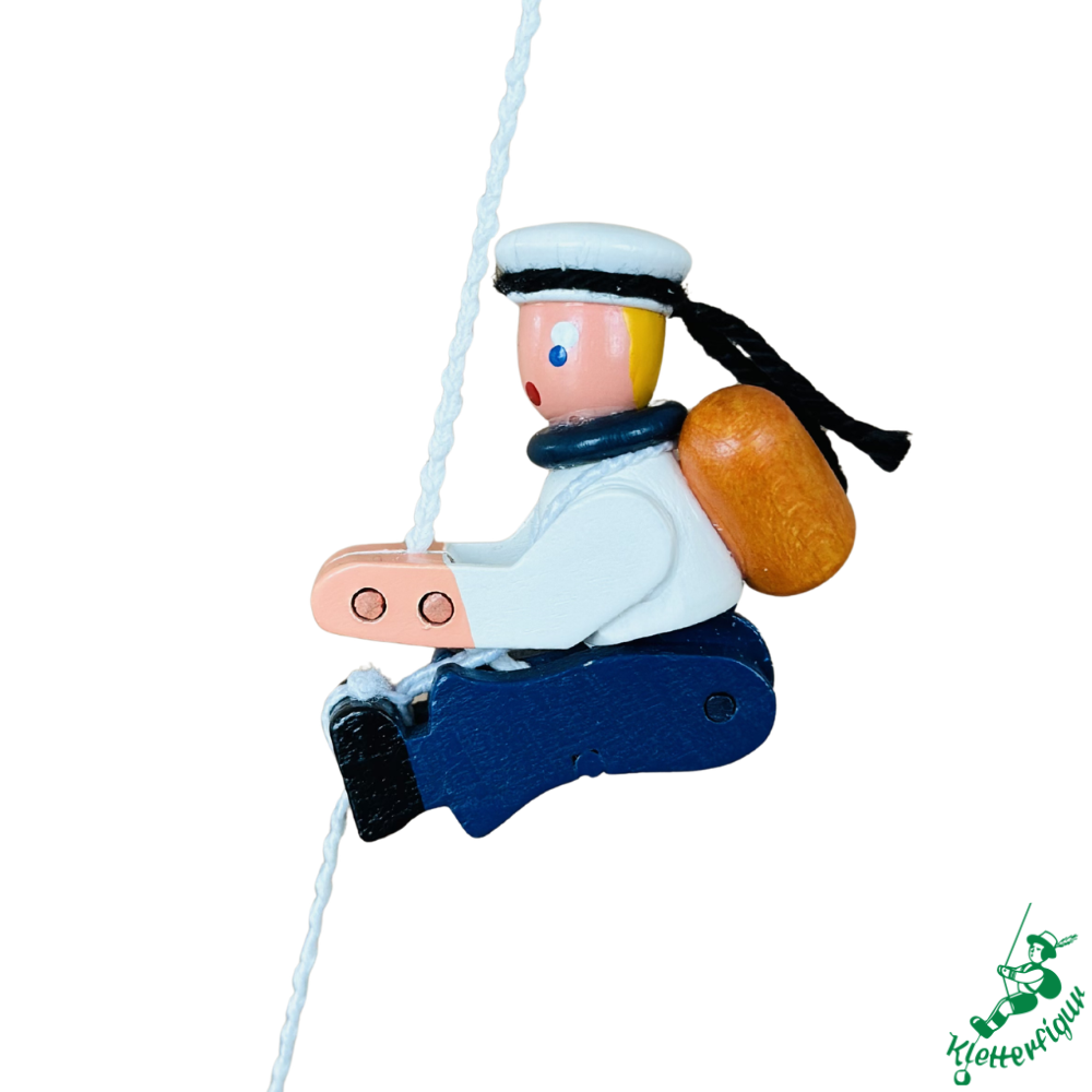 Climbing Sailor Figurine with Duffle Bag
