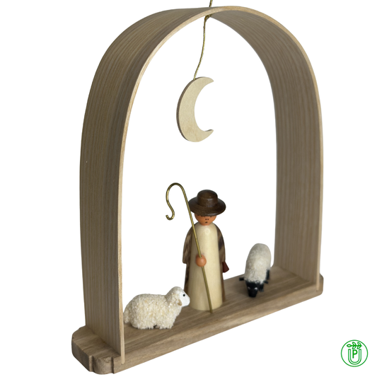 Hirte mit Schafen im Schwibbogen