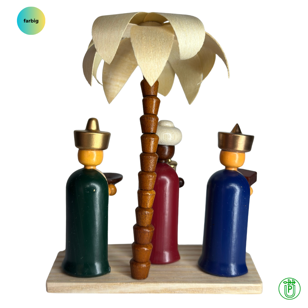 Three Kings on a pedestal with a palm tree